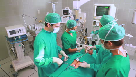 Surgeons-operating-a-patient-belly