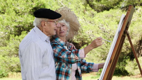Old-couple-painting-in-the-park