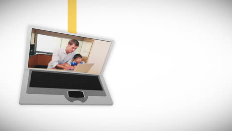 Video-Einer-Familie,-Die-In-Einer-Küche-Einen-Laptop-Benutzt