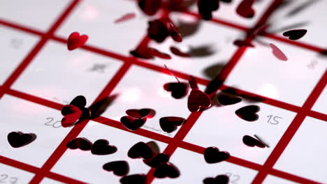 Dark-red-heart-confetti-dropping-on-calendar