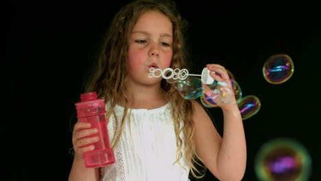 Little-girl-making-bubbles