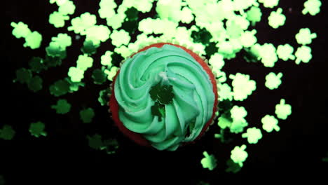 St-patricks-day-cupcake-revolving-with-green-shamrock-confetti-falling