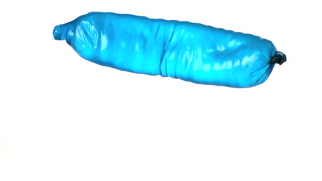 Blue-condom-filled-with-water-falling-and-bouncing