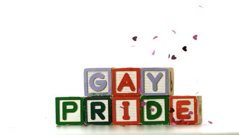 Konfetti-Fällt-Auf-Blöcke,-Die-Gay-Pride-Buchstabieren