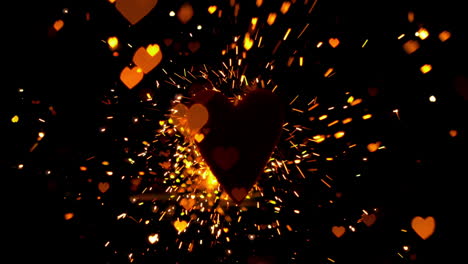 Golden-confetti-and-sparks-flying-against-heart