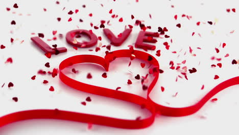 Love-text-and-heart-ribbon-with-lots-of-confetti