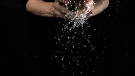 Water-falling-onto-hands