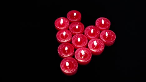 Burning-candles-in-form-of-heart