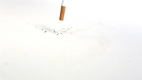 Cigarette-filling-on-the-floor-on-white-background