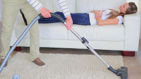 Woman-napping-while-man-doing-the-housework