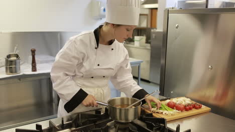 Chef-preparing-a-soup-and-smelling-it