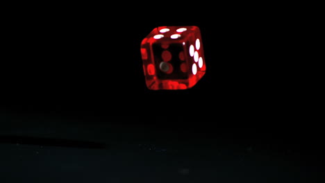 Red-dice-falling-and-bouncing-close-up