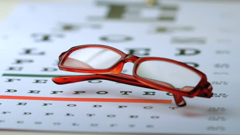 Reading-glasses-falling-onto-eye-test