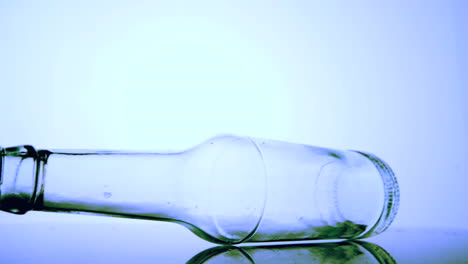 Empty-glass-bottle-spinning