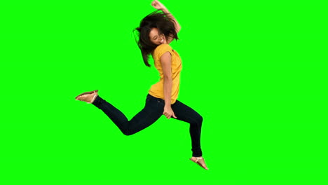 Woman-jumping-on-green-screen