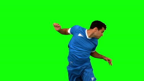 Mann-Köpft-Einen-Football-Auf-Einem-Greenscreen