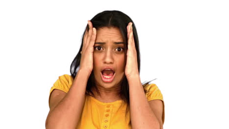 Shocked-woman-putting-hands-on-head-on-white-background