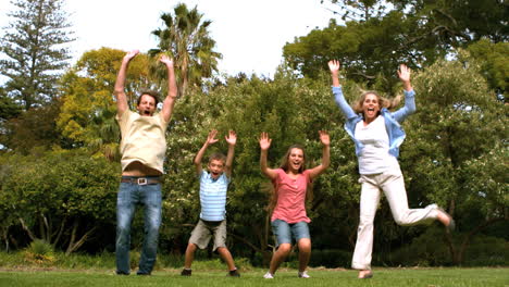 Happy-family-jumping-together-