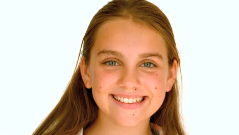 Girl-smiling-against-white-background