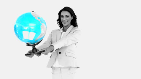 Businesswoman-holding-globe