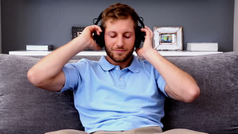 Man-listening-to-music-and-relaxing