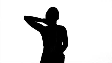 Silhouette-of-woman-with-hand-on-the-neck-on-white-background