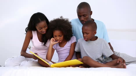Son-reading-story-to-his-family