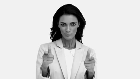 Businesswoman-snapping-her-fingers-and-pointing