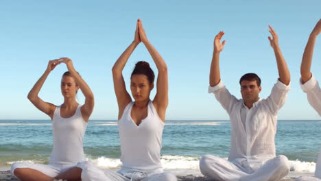 Yoga-class-on-the-beach