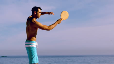 Man-playing-with-racket