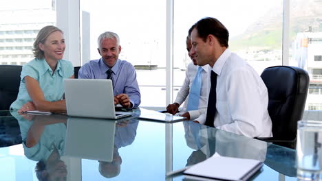 Group-of-business-people-using-tablet-computer-and-laptop