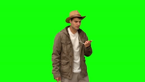 Lost-man-using-a-compass-on-green-screen