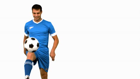 Man-playing-with-a-football-on-white-screen-