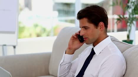 Business-man-on-phone