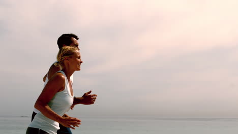 Jogger-Joggen-über-Den-Strand