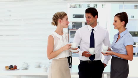 Business-people-having-a-coffee-at-break-time