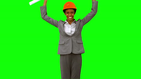 Architect-raising-arms-on-green-screen