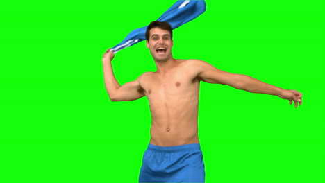 Cheerful-football-player-celebrating-a-goal-on-green-screen