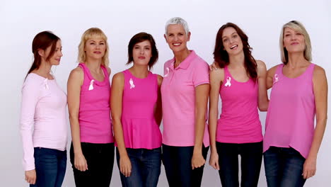 Women-giving-thumbs-up-for-breast-cancer-awareness