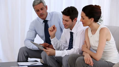 Business-people-sitting-on-couch