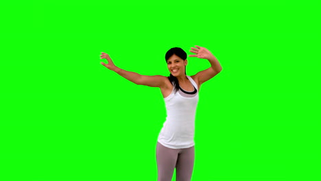 Frau-In-Sportkleidung-Springt-Auf-Greenscreen