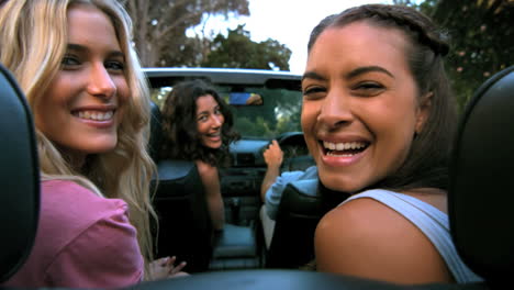 Friends-laughing-in-the-car