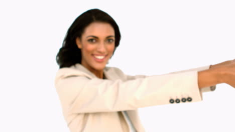 Businesswoman-showing-piggy-bank-to-the-camera