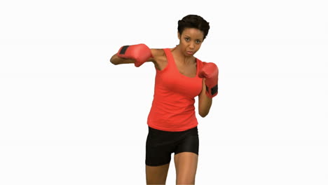 Attractive-woman-boxing-on-white-screen-in-slow-motion