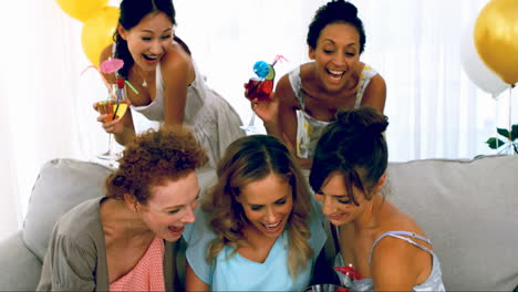 Women-taking-pictures-at-party