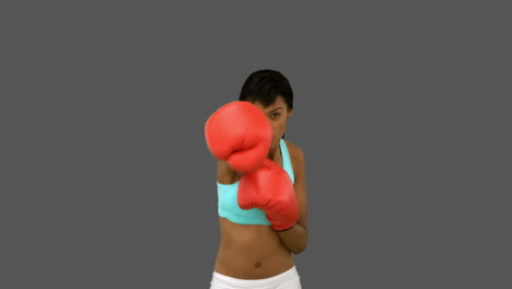 Hermosa-Mujer-Con-Guantes-Rojos-De-Boxeo.