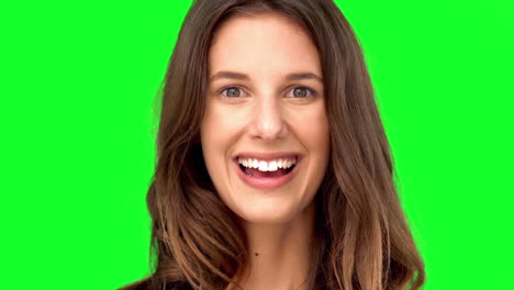 Surprised-woman-smiling-on-green-screen