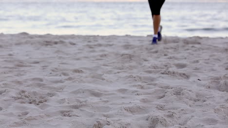 Woman-jogging-on-the-beach