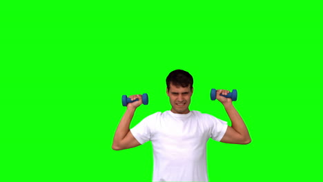 Man-lifting-dumbbells-on-green-screen
