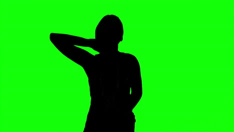 Silhouette-of-woman-with-hand-on-the-neck-on-green-screen